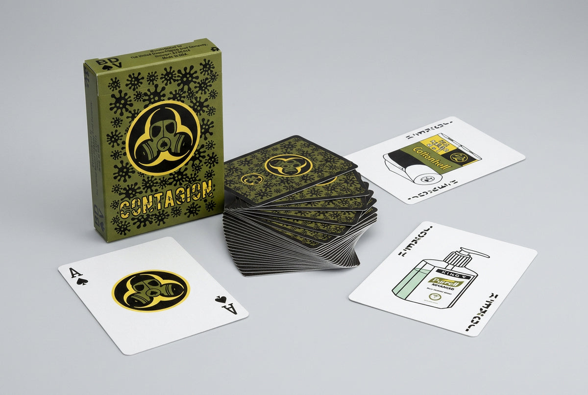 Contagion Playing Cards by Bill Davis Magic – Green and black virus-themed deck showing the custom tuck box, card backs, Ace of Spades and special magic cards.