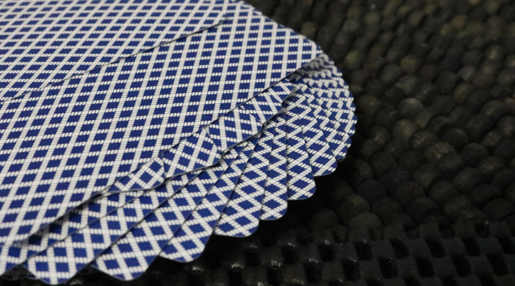 Close-up of Bee Club Special Blue Playing Cards showing the traditional blue diamond-back pattern and card finish.