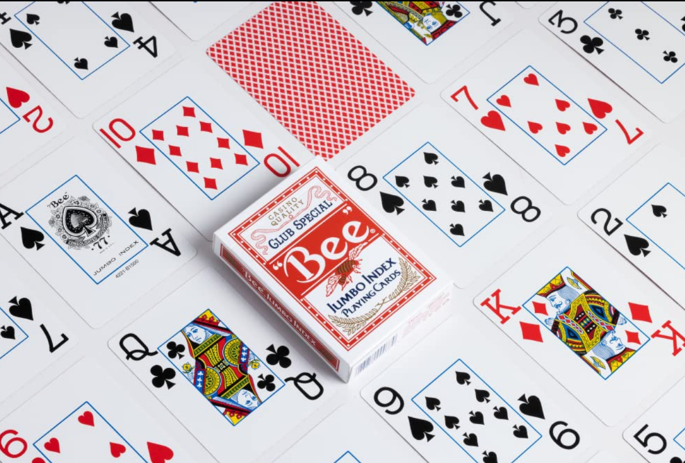 Bee Club Special Jumbo Index red playing cards displayed with the red tuck box, jumbo index card faces and classic red diamond-pattern backs