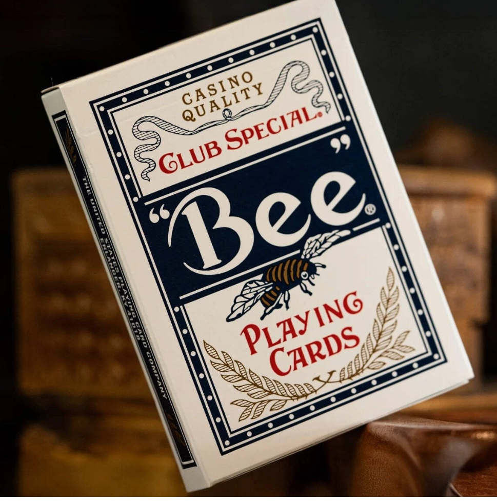 Close-up of Bee Club Special Standard Index Blue Playing Cards showing the classic navy blue tuck box, Bee logo and casino-quality design.