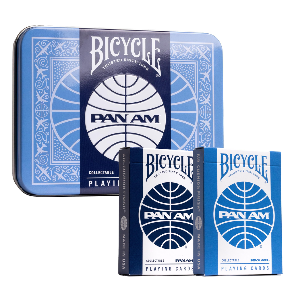 Bicycle Pan Am collectible playing cards gift set featuring navy blue and light blue decks displayed in front of a blue metal storage tin with the classic Pan Am globe logo.