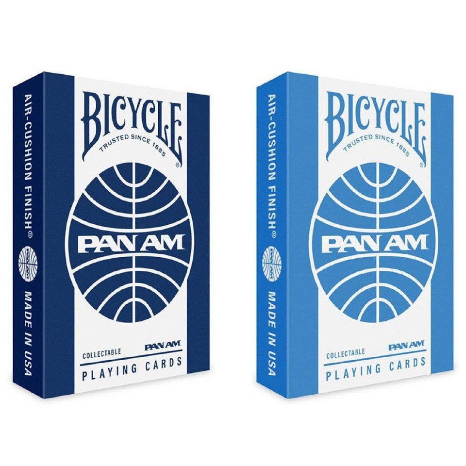 Two Bicycle Pan Am collectible playing card decks in navy blue and light blue tuck boxes, featuring the classic Pan American World Airways globe logo.