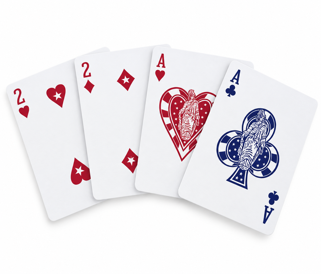Bicycle Stars and Stripes playing cards arranged in a fan, featuring the Two of Hearts, Two of Diamonds, Ace of Hearts and Ace of Clubs with patriotic red and blue artwork on a white background.