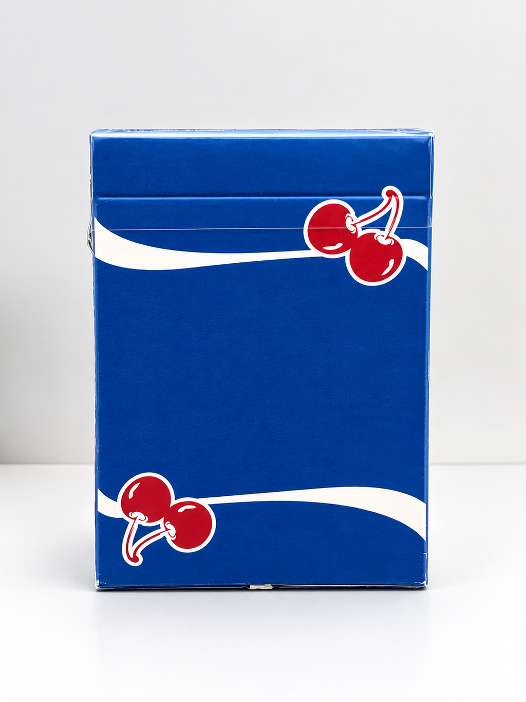 front of Cherry Casino Tahoe Blue Playing Cards tuck box featuring a vibrant blue finish, red cherry artwork, flowing white stripes and original sealed packaging.