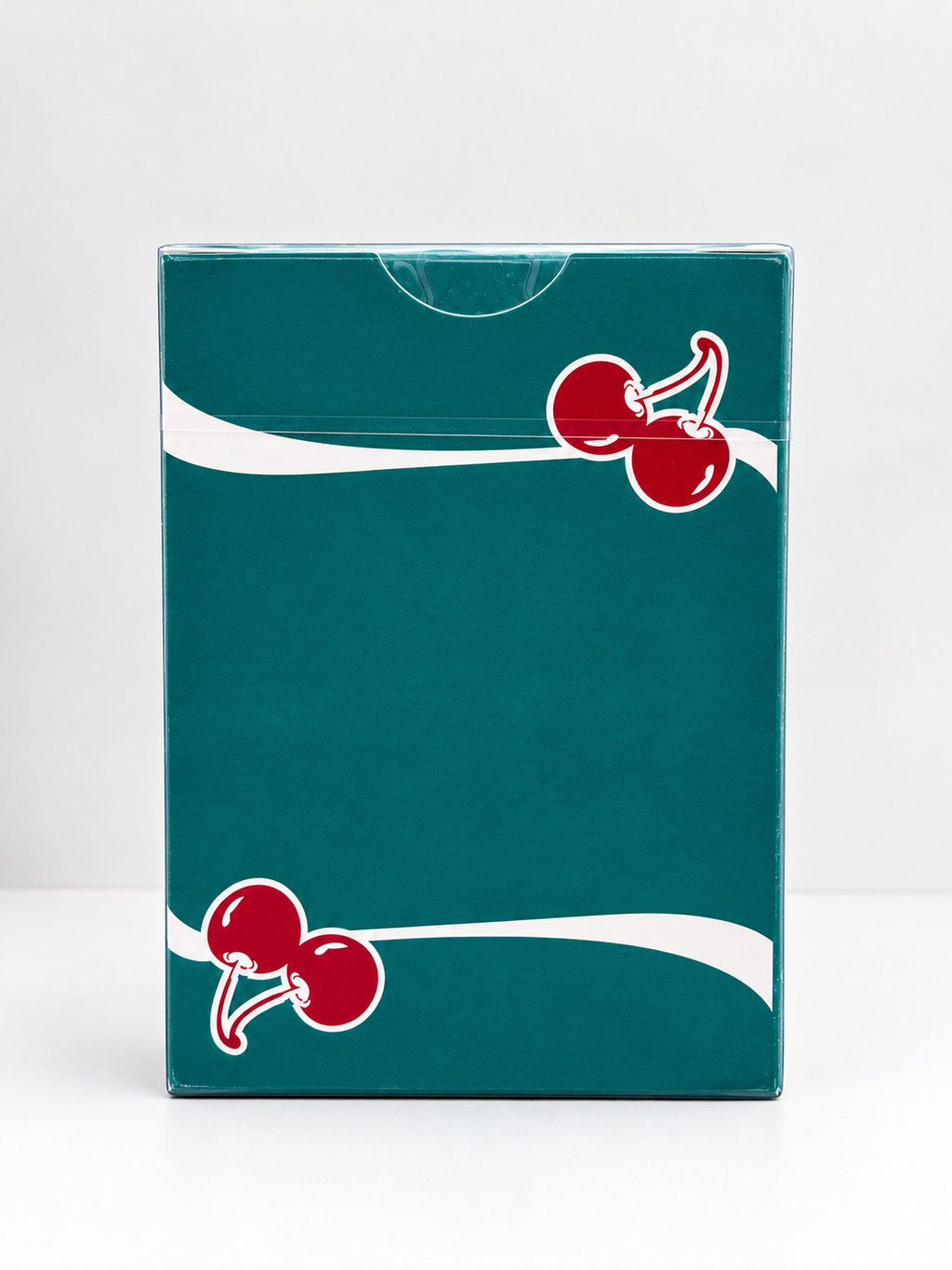 Rear view of Cherry Casino Tropicana Teal Playing Cards showing the metallic teal tuck box, red cherry artwork, flowing white stripes and sealed packaging.