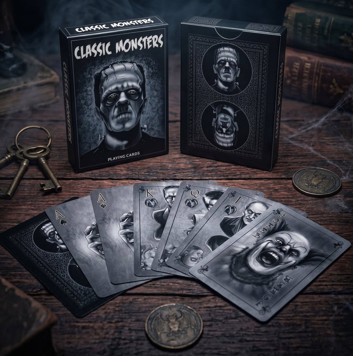 Classic Monsters Playing Cards by Collectible Playing Cards showing Frankenstein tuck box, gothic card backs and illustrated monster court cards and Joker.
