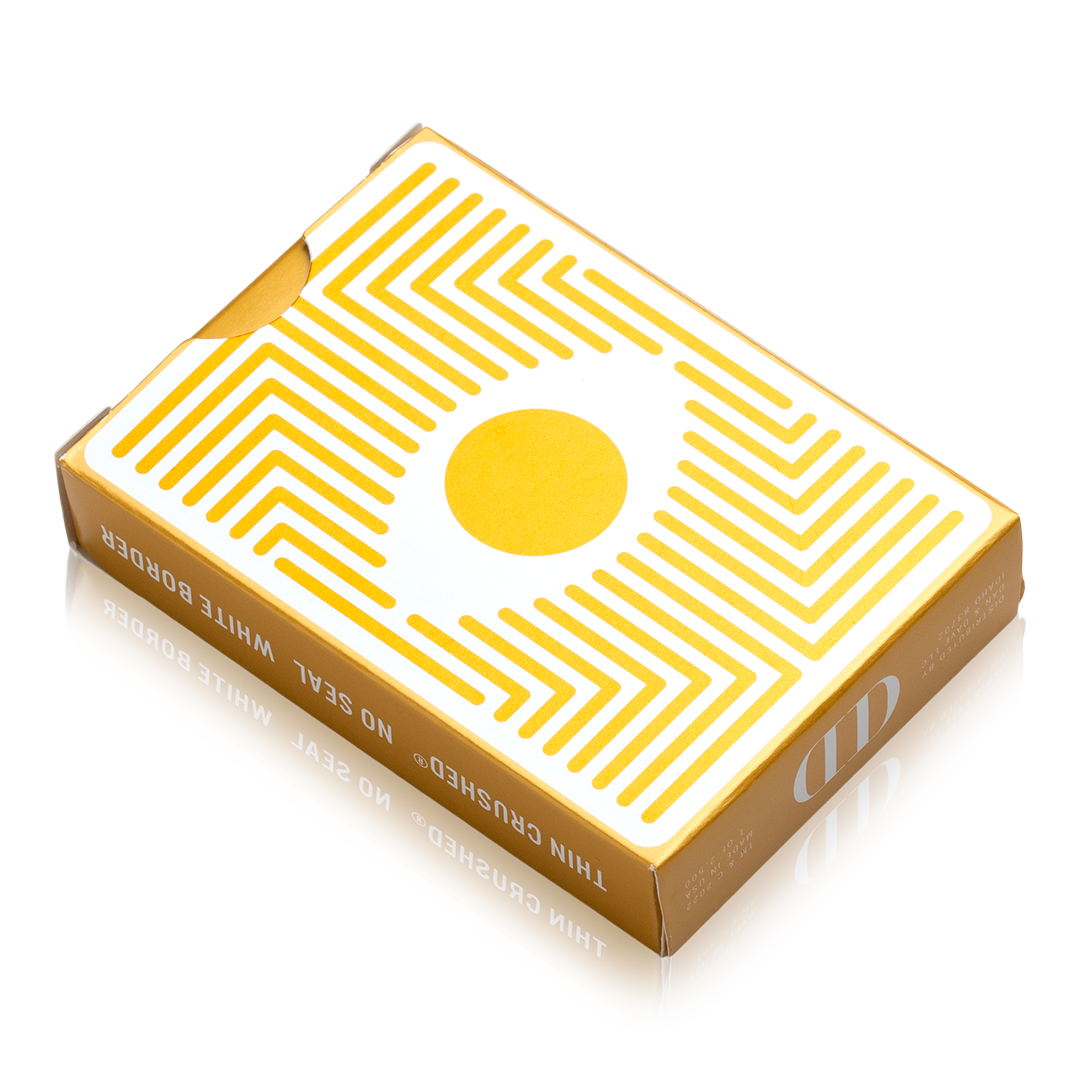 Damn Good Cards No. 6 by Dan & Dave showing the yellow and white geometric design on the tuck box, with angled lines surrounding a central yellow circle.
