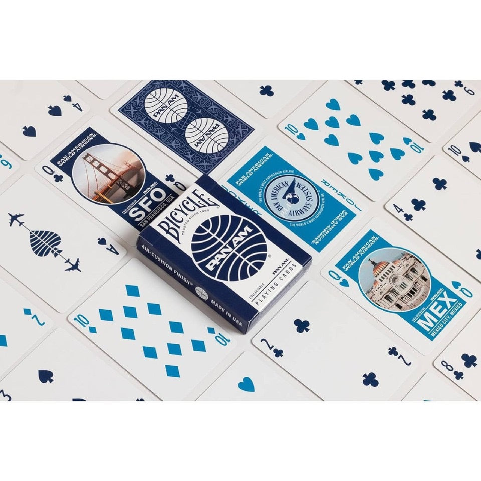 Bicycle Pan Am collectible playing cards featuring navy blue and turquoise card designs, vintage airline artwork, Pan Am tuck box and aviation-themed court cards.