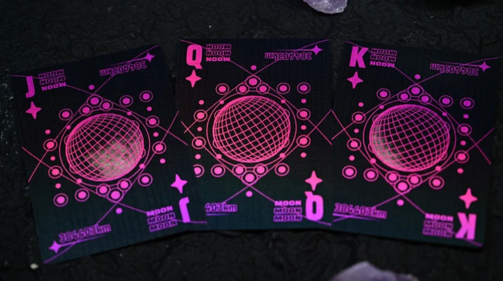 Moon Black Holo Playing Cards by Hiddenlight showing custom Jack, Queen and King court cards with black backgrounds, vibrant holographic pink geometric patterns and central wireframe lunar sphere designs.
