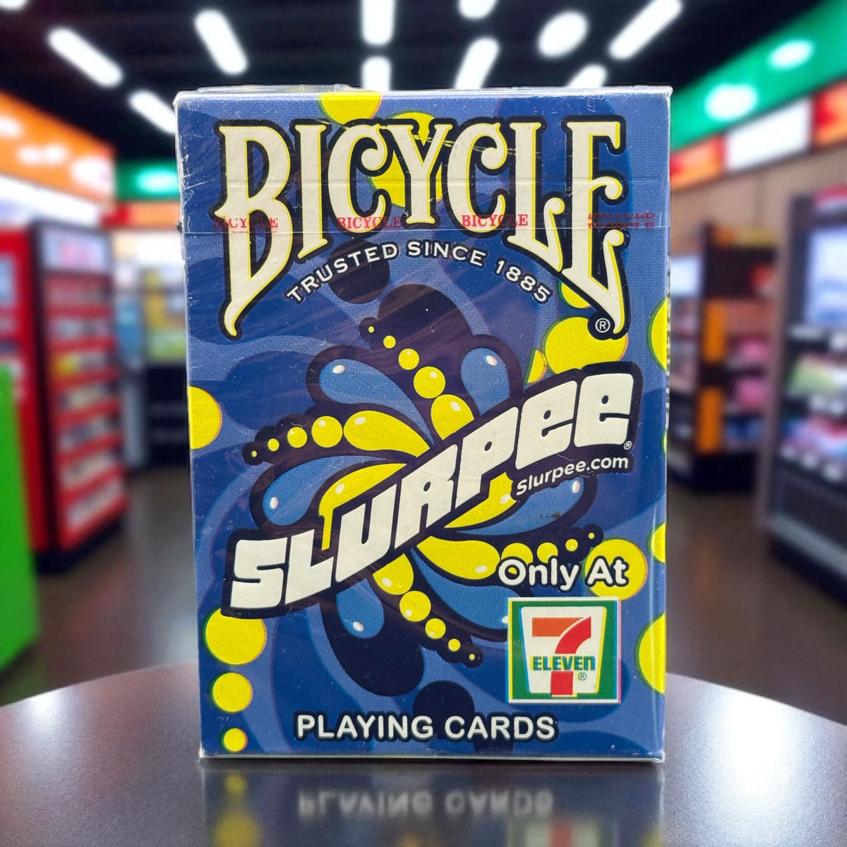 Bicycle 7-Eleven Slurpee 2020 Blue Playing Cards limited edition deck displayed in a 7-Eleven store