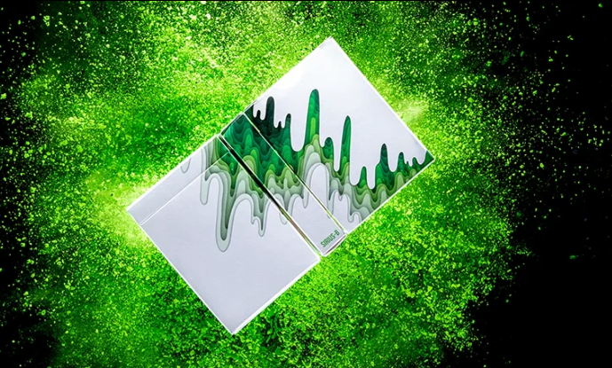 SIRIUS-B V4 Spring Edition Playing Cards by Riffle Shuffle displayed against a vivid green promotional background
