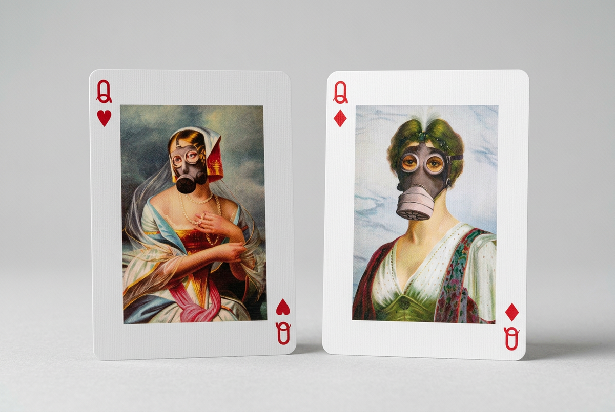 Piatnik More Banksy playing cards showing the queen of hearts and queen of diamonds with portraits of women wearing gas masks