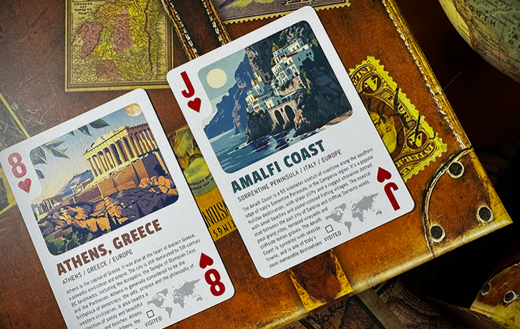 Travel the World Volume 1 playing cards by Midnight Cards featuring the Eight of Hearts with Athens, Greece, and Jack of Hearts with the Amalfi Coast, Italy.