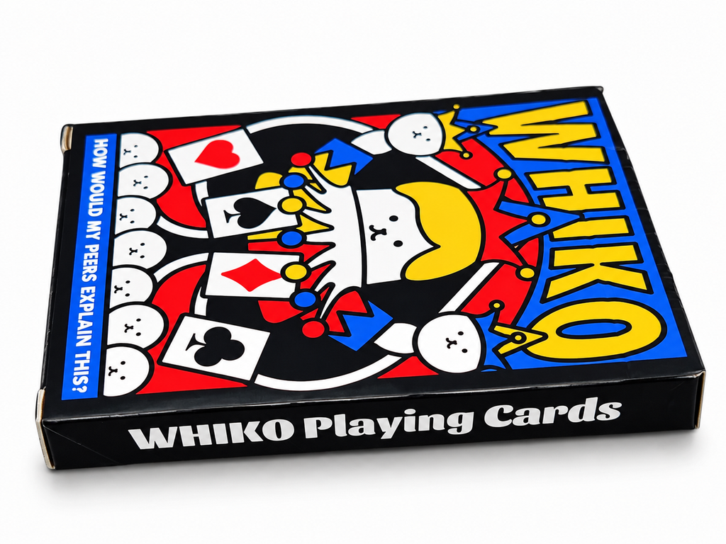 Angled side view of WHIKO Stage Thin Playing Cards featuring colourful cartoon jester artwork, bold yellow WHIKO lettering and Bacon Magic branding on the black sealed box.