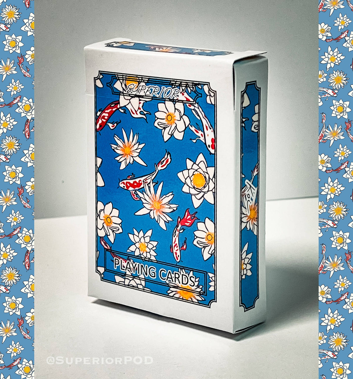 Japanese Koi Fish Playing Cards featuring colourful koi carp and white lotus flowers on blue card backs